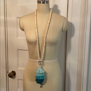 Wooden bead necklace with tassle